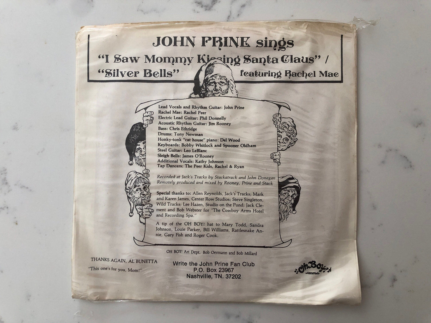 John Prine, I Saw Mommy Kissing Santa Claus, Silver Bells, 80's Folk Records, Rare Records, Red Vinyl, Rachel Mae no OB-1, 7” record
